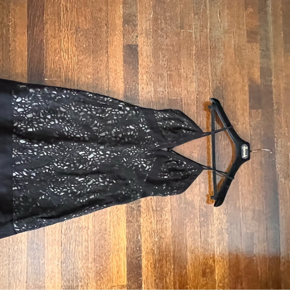Black suede cocktail dress above the knee length.